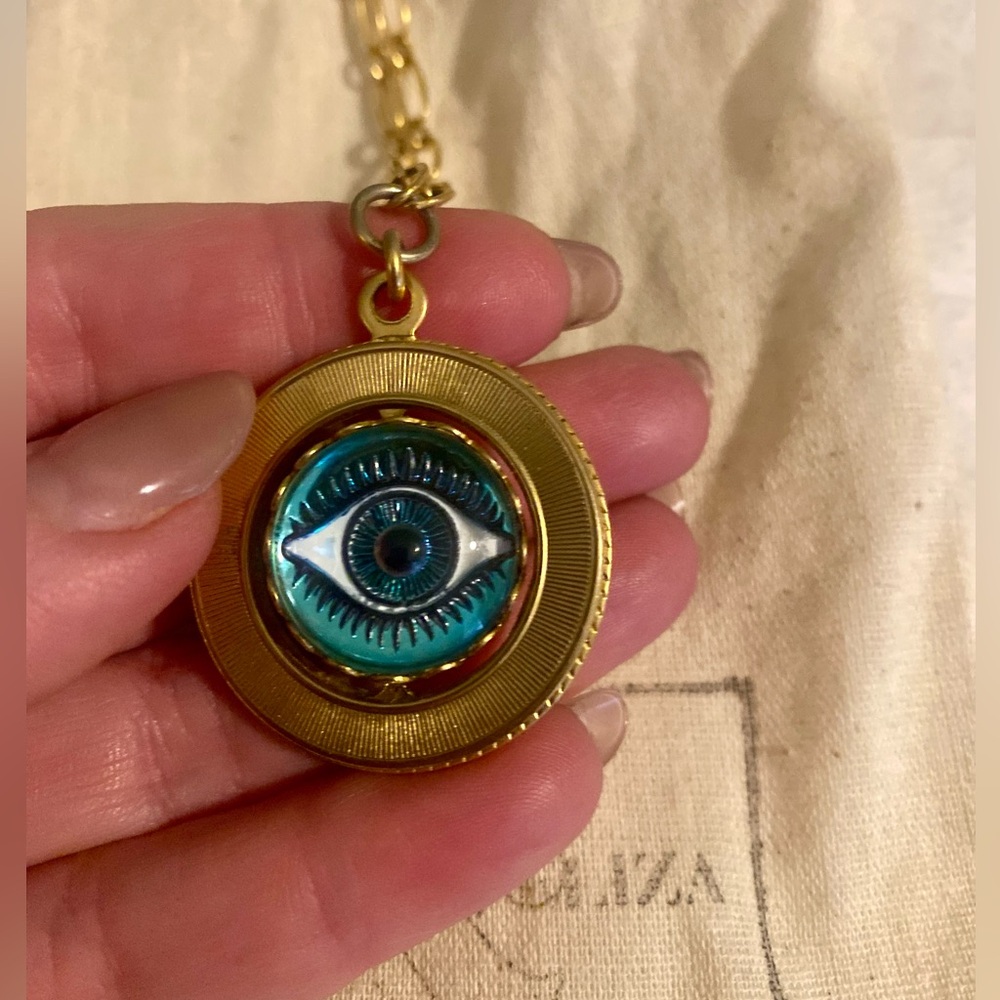 Brinker and Eliza Gold and Blue Evil Eye Spinning Pendant